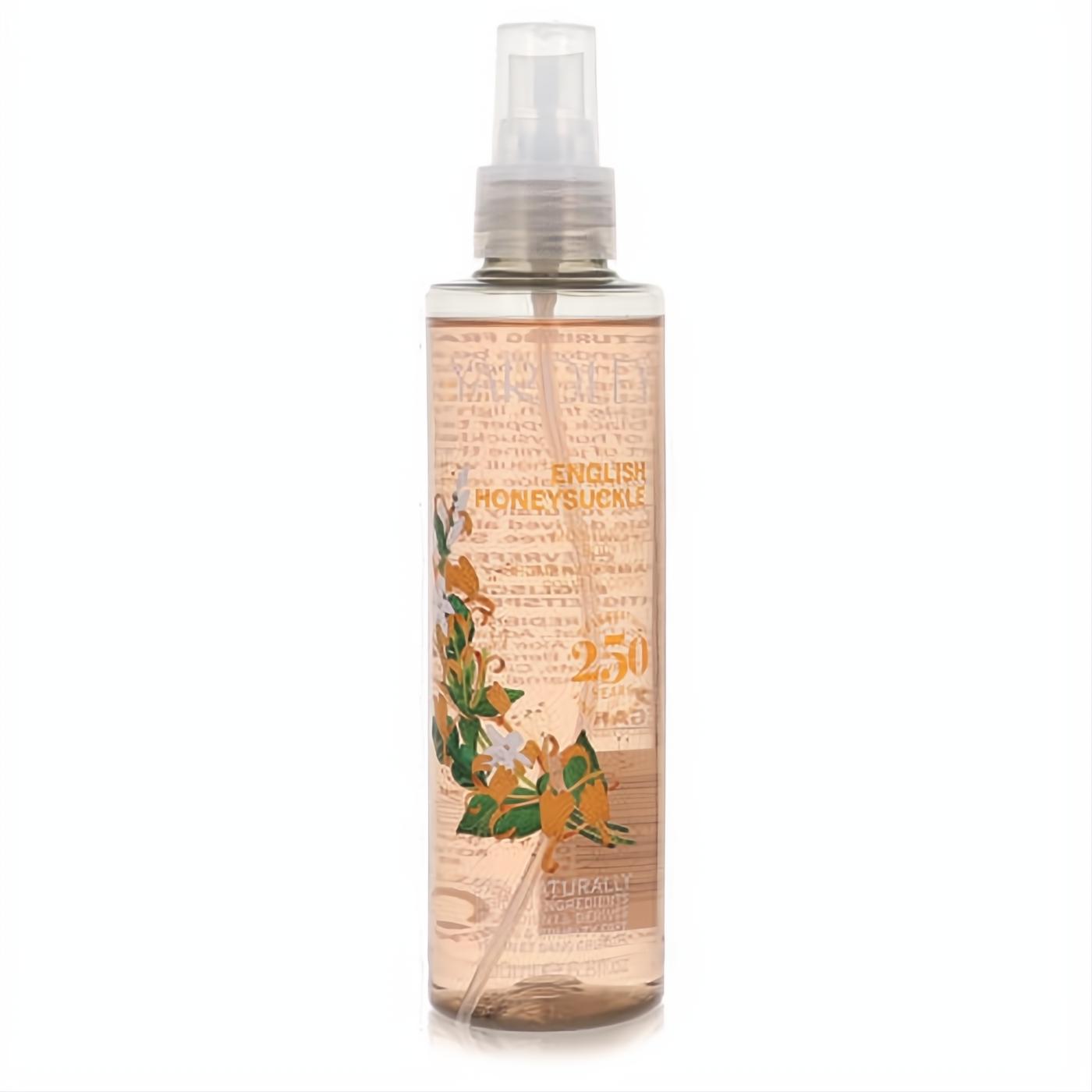 Yardley English Honeysuckle moisturizing body mist in a clear 250ml bottle, adorned with vibrant orange honeysuckle flowers.