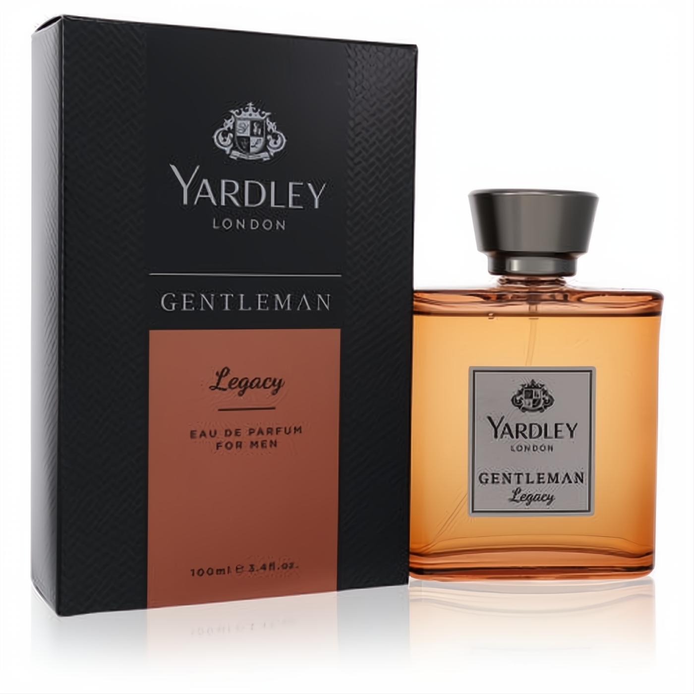Elegant Yardley Gentleman Legacy 3.4 oz EDP for men. Amber fragrance in a sleek glass bottle with gunmetal cap, next to its black and bronze box.
